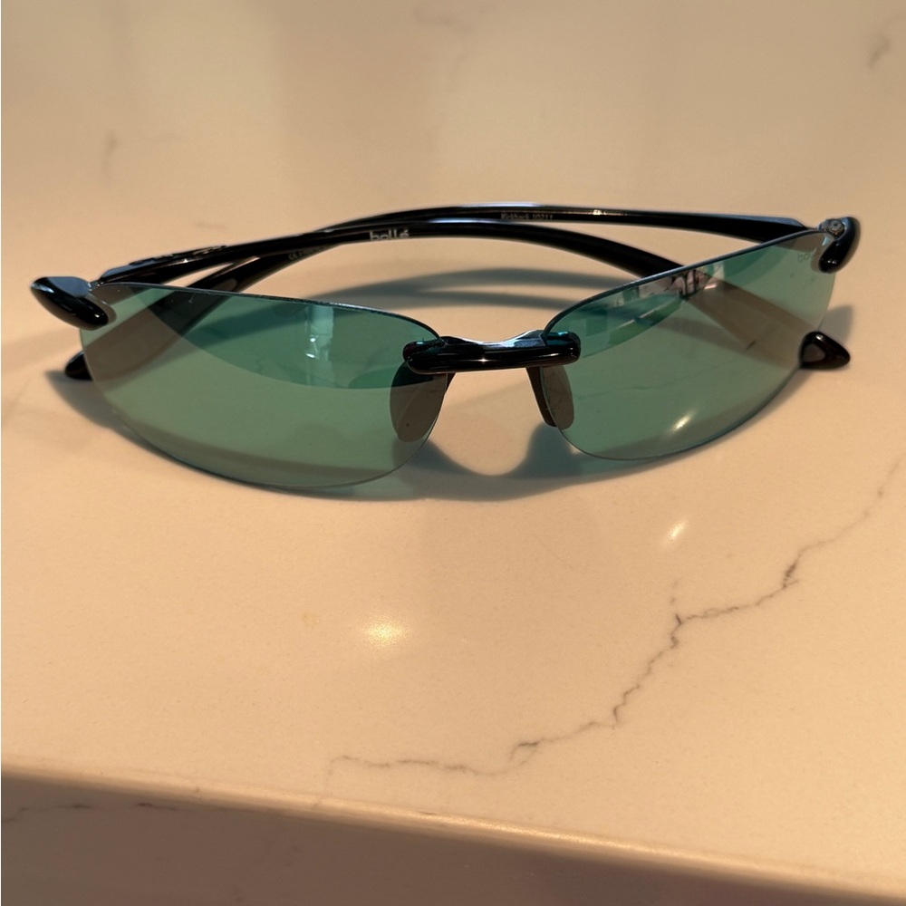 Bolle "Kickback" Sunglasses with Black Frame and Teal Lenses